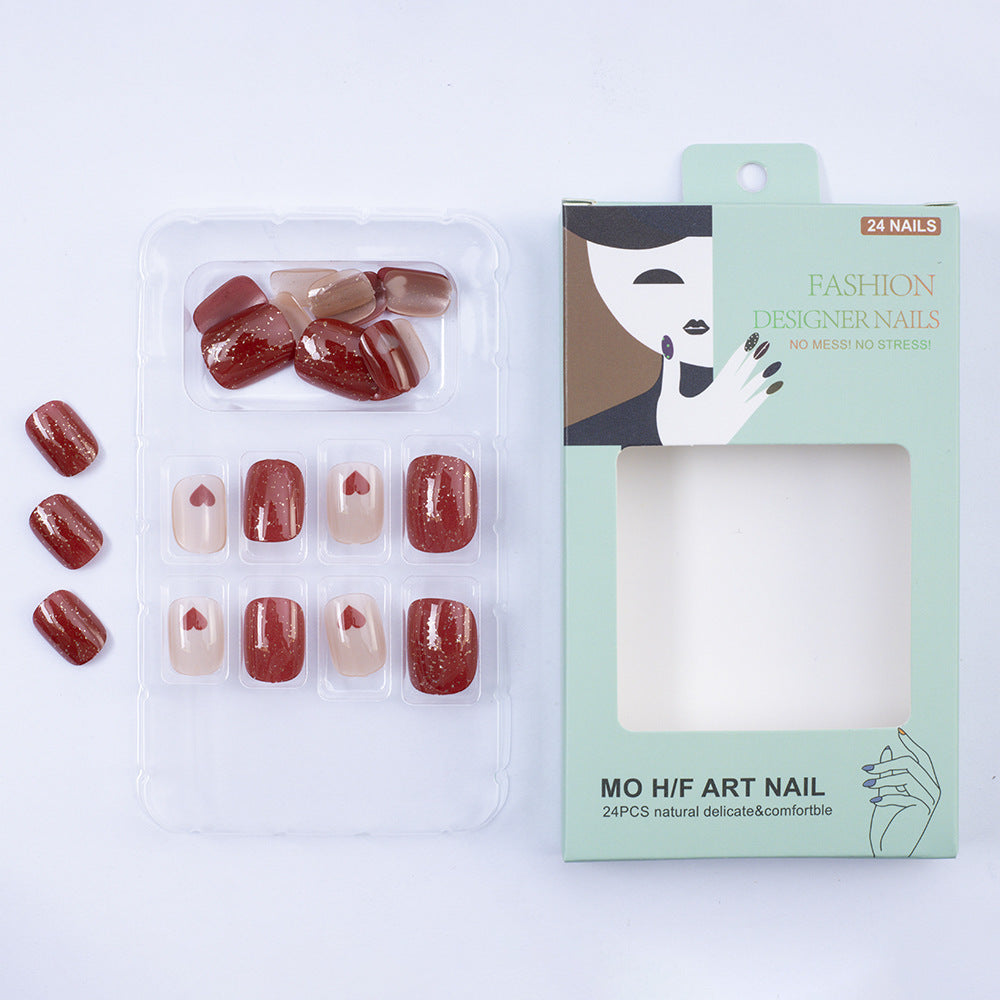 Kunstnagelset mit Herzmotiven und Glitzer Brehn