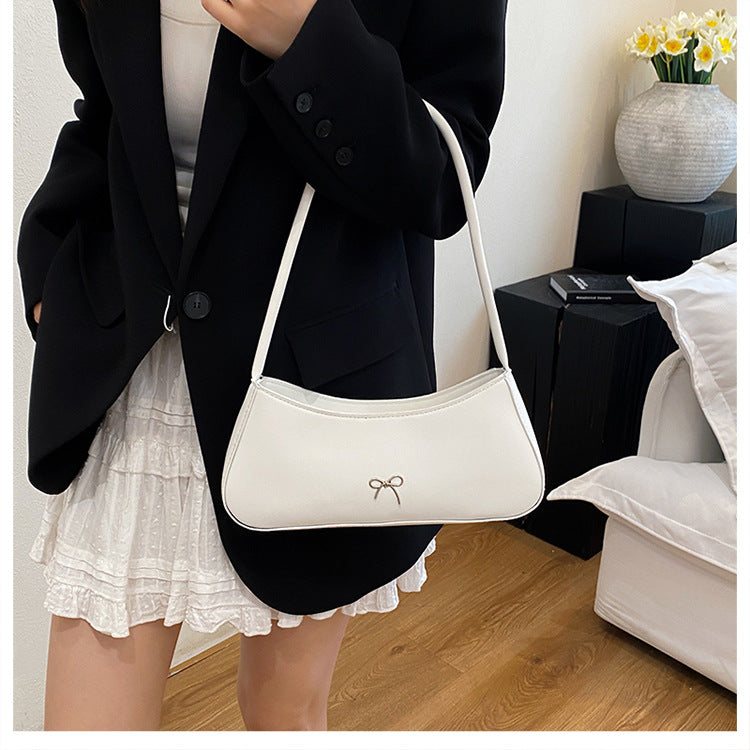 Elegante geschwungene Handtasche Brehn