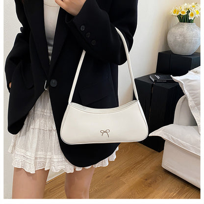 Elegante geschwungene Handtasche Brehn