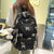 Gesteppt gestickter Rucksack mit Schleifenmotiv Brehn