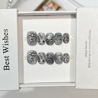 Künstlerisches Press-On Nagelset mit verspielten Charakterdesigns Brehn