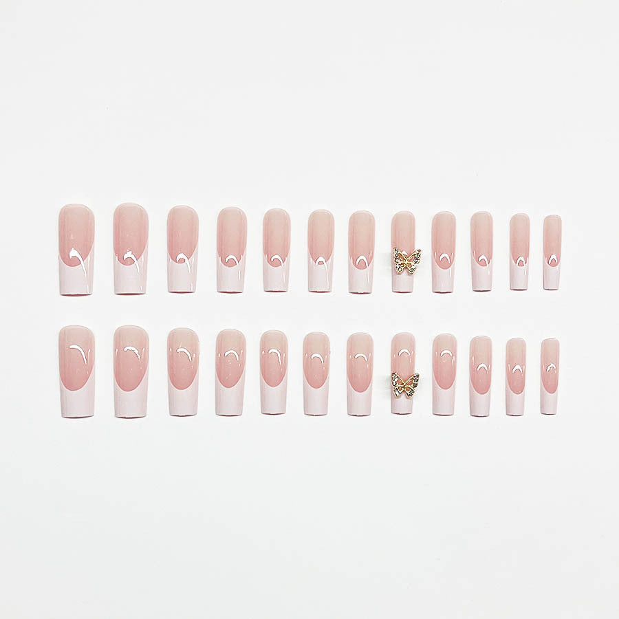 Elegantes Kunstnagelset mit Schmetterlingsakzenten Brehn