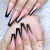 Kunstnagelset mit elegantem Stiletto-Design und glänzenden Akzenten Brehn