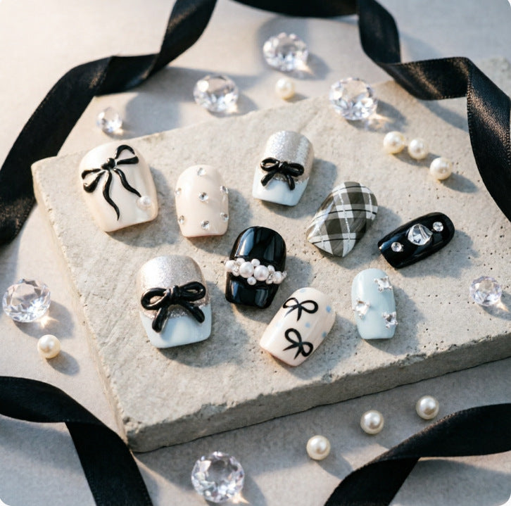 Kunstnägel mit Eleganten Schleifen und Strass Brehn