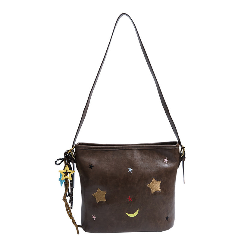 Schultertasche mit Charmanten Applikationen Brehn