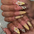 Dekorative Stiletto Nagelkunst Tipps mit floralen Akzenten Brehn