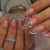 Kunstnagelset mit hochwertigen Glitter- und Strassverzierungen Brehn