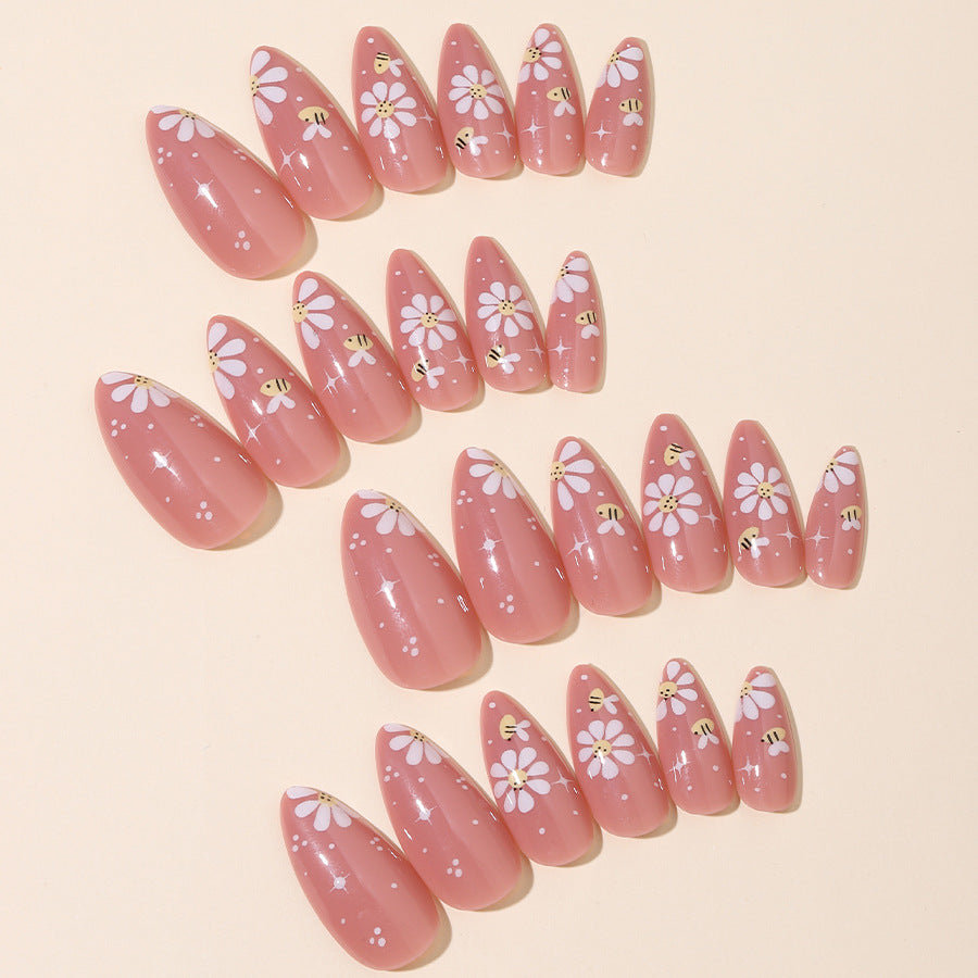 Kunstnägel Set mit eleganten Blüten und Glitzerakzenten Brehn