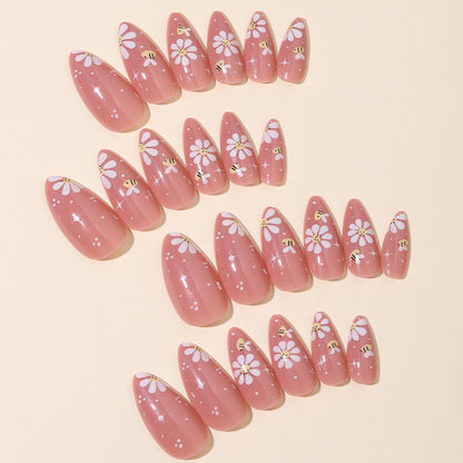 Kunstnägel Set mit eleganten Blüten und Glitzerakzenten Brehn