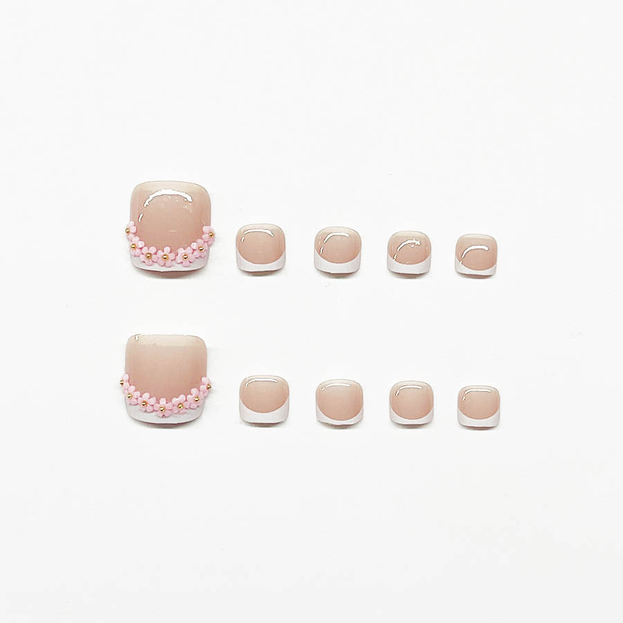 Fußnagelkunstset mit elegantem French Design und Glamourösen Strassakzenten Brehn