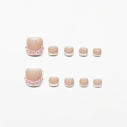 Fußnagelkunstset mit elegantem French Design und Glamourösen Strassakzenten Brehn