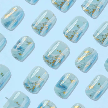 Kunstnagelset mit luxuriösem Marmor-Design und Goldakzenten Brehn