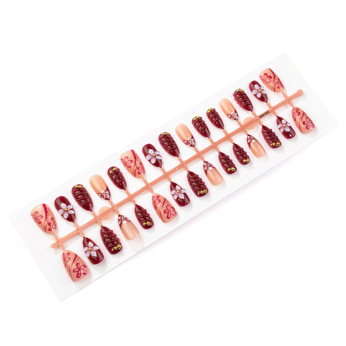 Künstlerisches Press-On Nagelkunst Set mit blumigen und glänzenden Designs Brehn