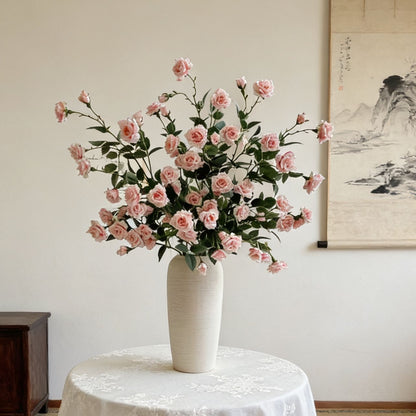 Lebensechte rosa Rosen Blumenarrangement