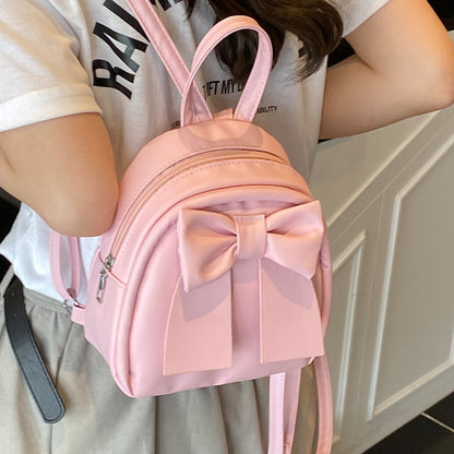 Bogenakzentierter Faux-Leder Mini-Rucksack