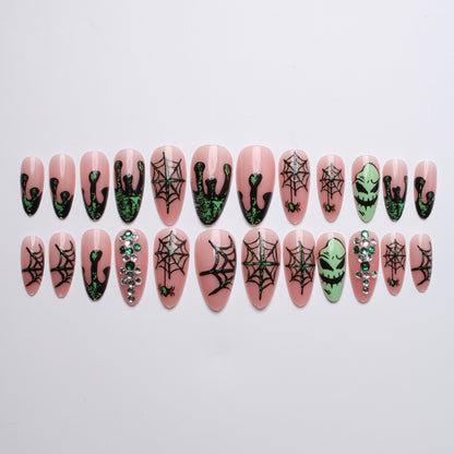 Kunstnägel mit Halloween-Spider-Design und Glitzerakzenten Brehn