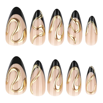 Kunstvolle Stiletto-Nägel mit elegantem Gold-Design Brehn
