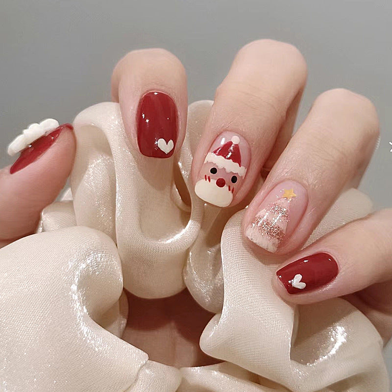 Urlaubs-Themen Press-On Nail Set mit lustigen Weihnachtsmann- und Herzdesigns Brehn
