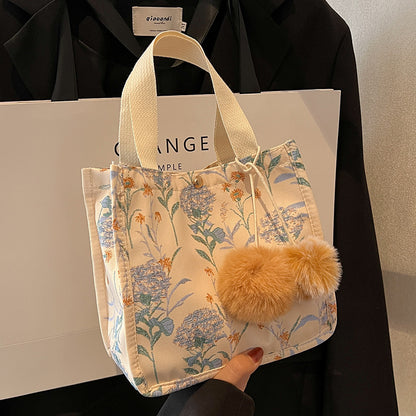 Blumenverzierte Tasche