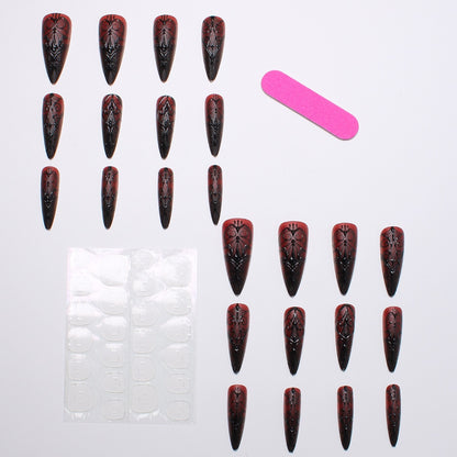 Künstliche Nagelspitzen mit Gothic-Design und filigranen Mustern Brehn