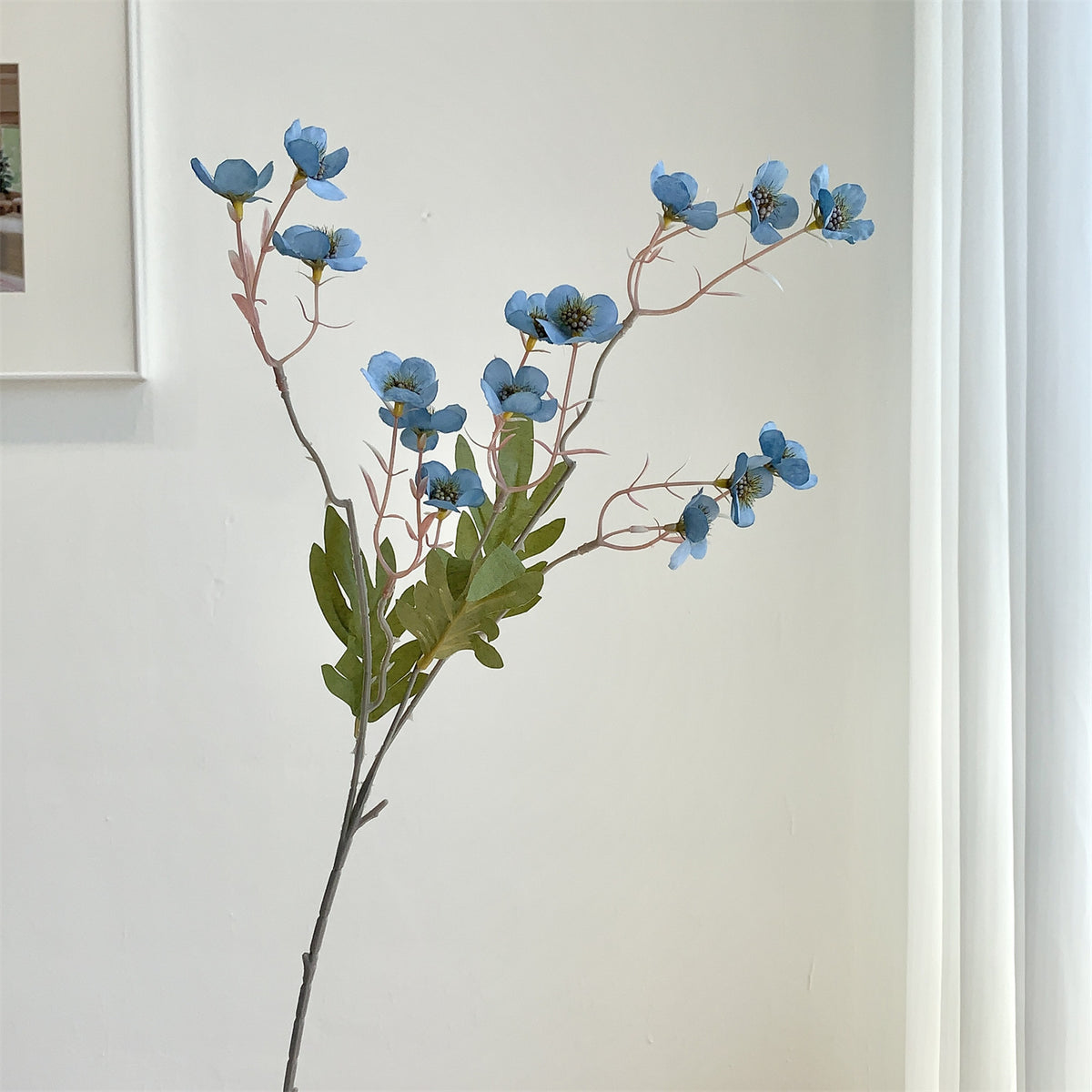 Dekorativer künstlicher Blumenzweig