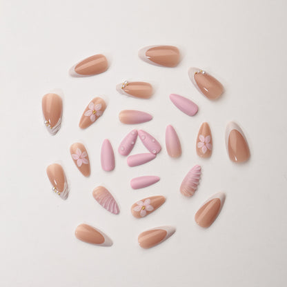 Kreatives Kunstnagelset mit floralem und schimmerndem Design Brehn