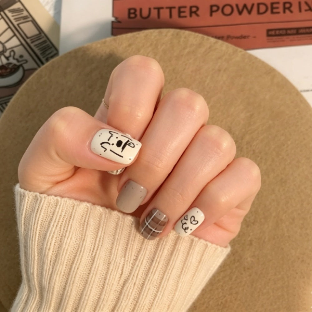 Künstlerisches Press-On-Nagelset mit einzigartigen Charakterdesigns Brehn