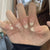 Künstlerisches Press-On-Nagelset mit elegantem Schleifen-Design Brehn