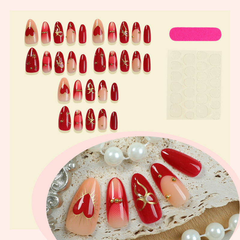 Dekorativer Press-On-Nagelset mit eleganten Herz- und Blumendesigns Brehn
