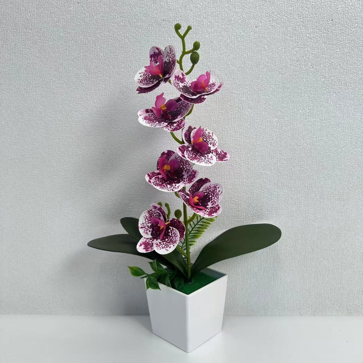 Realistische künstliche Orchideenblütenarrangement für die Innenausstellung