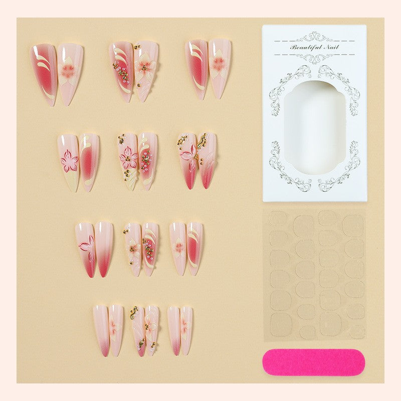Kunstnagelset mit floralen und glamourösen Designs Brehn