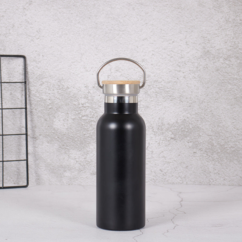 Damen Edelstahl Trinkflasche mit Bambusdeckel und Tragegriff Brehn