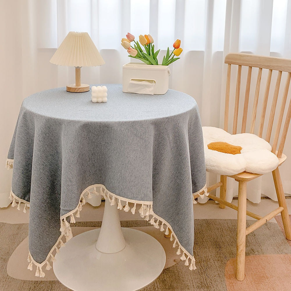 Runde strukturierte Tischdecke mit Quastenbesatz und Leinen-ähnlichem Drapierfinish