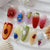 Künstlerisches 3D Obst Nageldesign Brehn