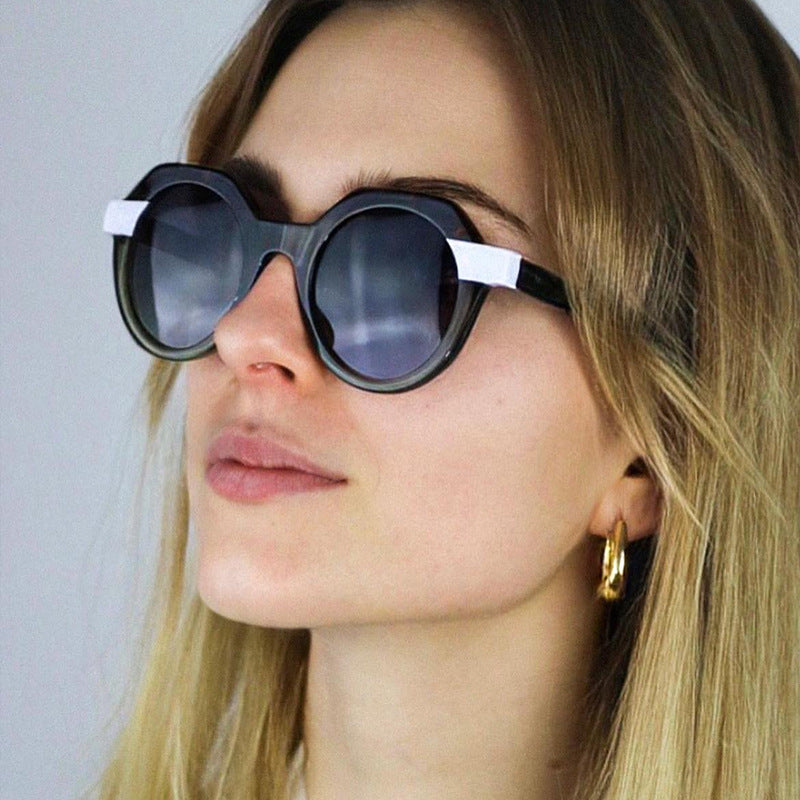 Damen extravagante runde Sonnenbrille mit farblich akzentuiertem Rahmen Brehn