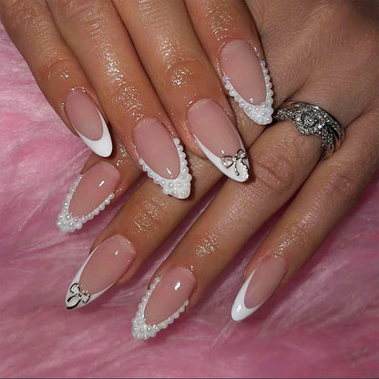 Glamouröse Kunstnagel Set mit eleganten Schleifen und Glitzerakzenten Brehn