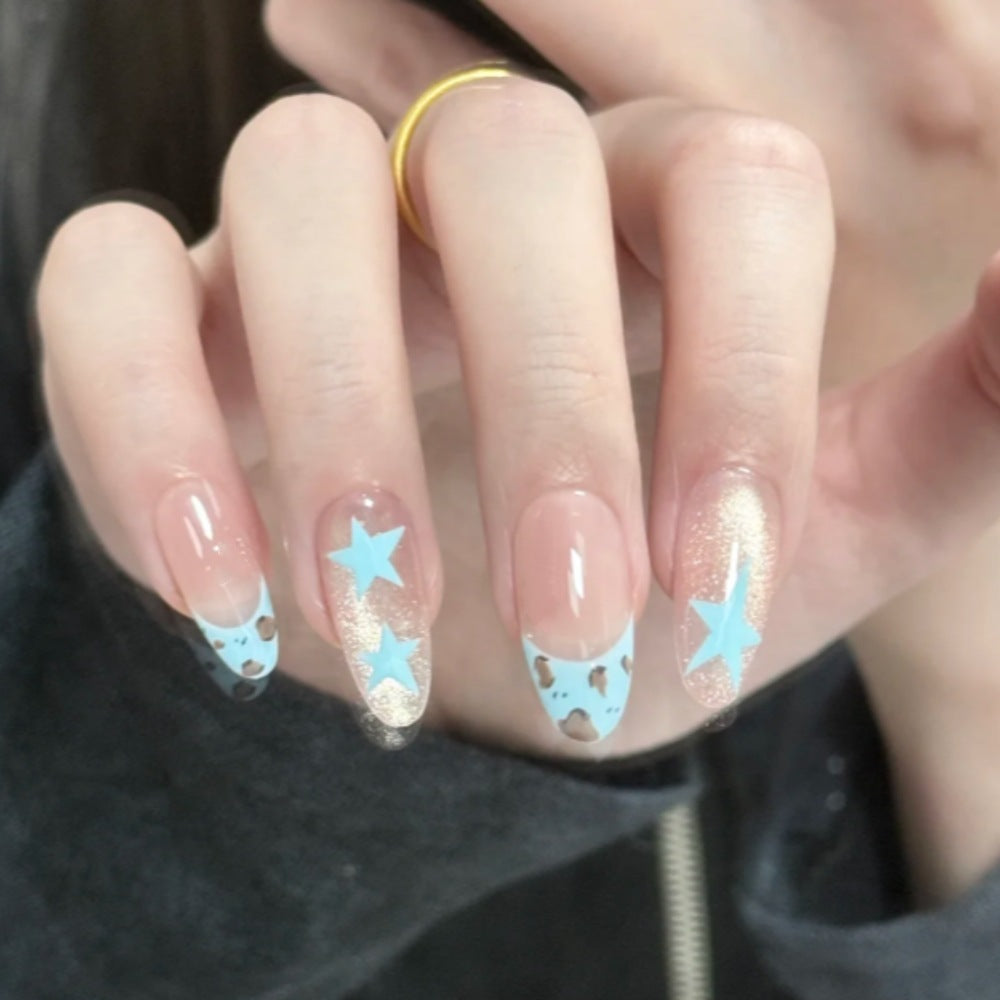 Themen Press-On Nail Set mit Stern- und Tierdruck Brehn