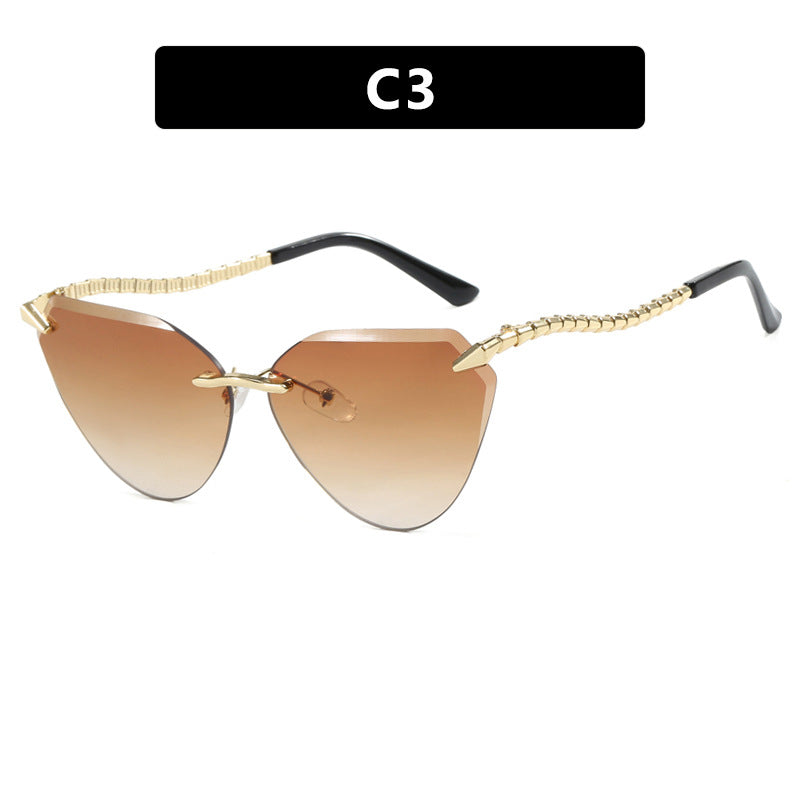 Damen Cat-Eye Sonnenbrille mit einzigartigem goldenen Rahmendesign und schützenden Gläsern Brehn