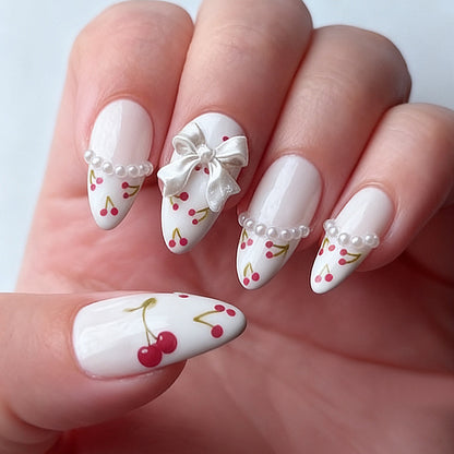 Kunstnagelset mit floralen Cherrymotiven und eleganten Schleifen Brehn