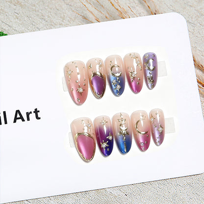 Glamouröse Kunstnägel mit Sternen- und Mondmotiven Brehn