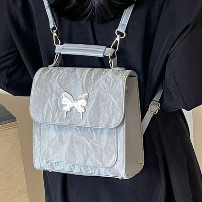 Schmetterlingsverzierte Handtasche