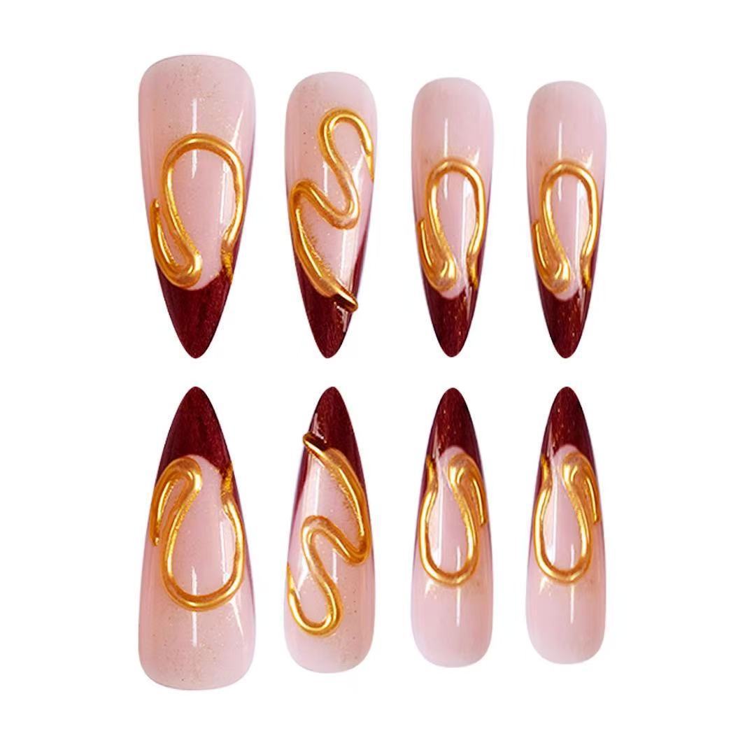 Künstlerische Stiletto-Nagelerweiterungen mit abstraktem Design Brehn