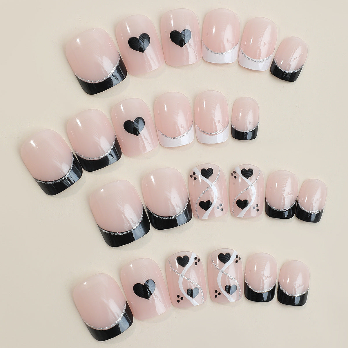 Kreatives Kunstnagelset mit süßem Herzdesign Brehn