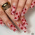 Kunstnagelset mit romantischem Herz-Motiv und Glitzer Brehn
