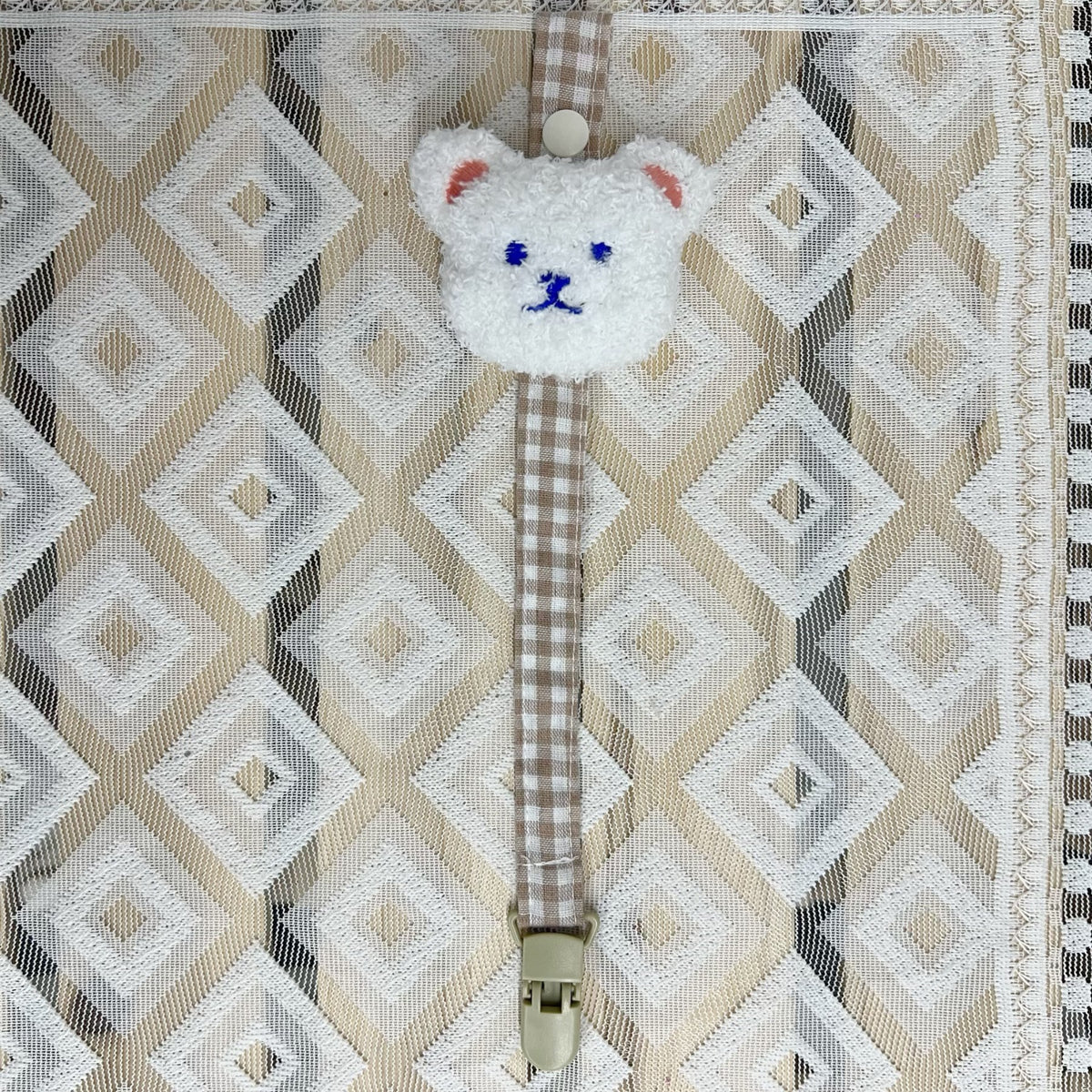 Blumenkleidungs-Schnullerclip mit Gingham-Baumwollgurt