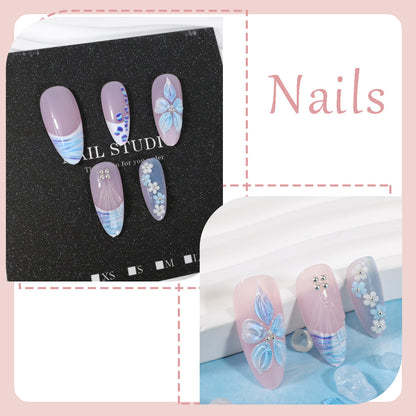 Kunstnagelset mit exquisiten blauen Blüten- und Glitzerverzierungen Brehn