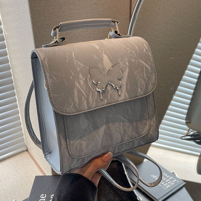 Schmetterlingsverzierte Handtasche