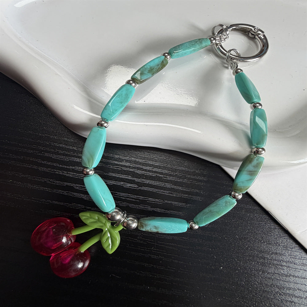 Charmante Kirsch Anhängerarmband Brehn