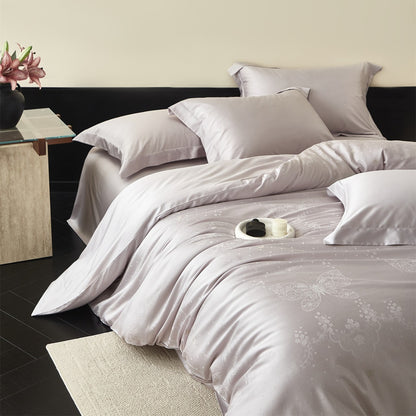 Seiden-Satin Bettbezug-Set mit subtiler Jacquard-Blumenmotiv und geflochtenen Kissenbezügen