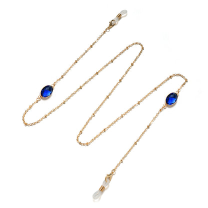 Eleganter mit Edelsteinen verzierter Brillenhalter Brehn